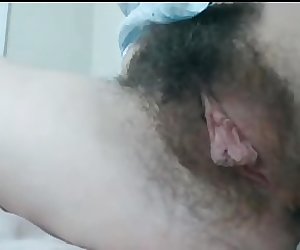Hairy pussy shown via webcam