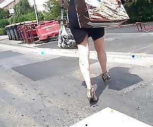 Slow Motion Sexy MILF with bare legs and high heels